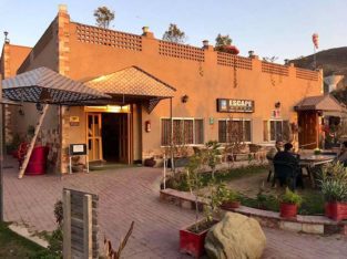 Escape Hotel Kallar Kahar.Stay in Natural Soothing Environment With Best Food