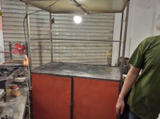 Selling Counter with Cabinet and also light fitted.